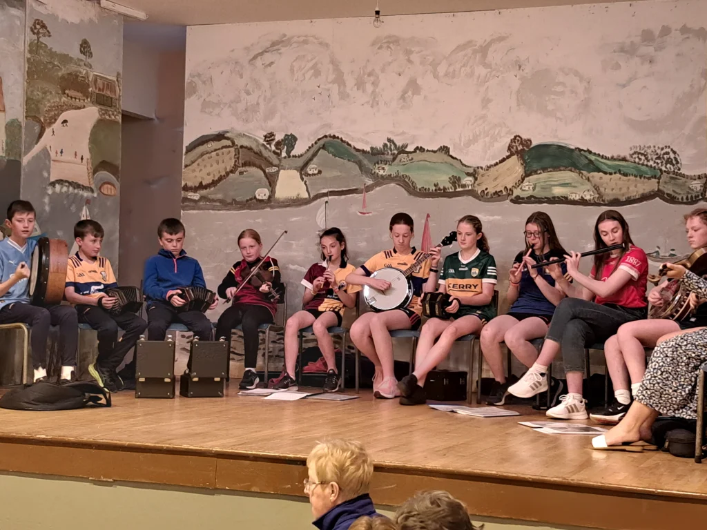 Group of girls playing music on the stage in Labasheeda hall