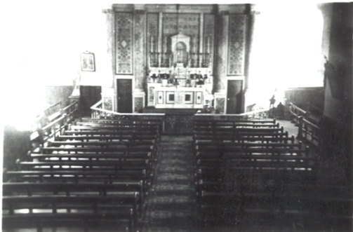 The altar originally located in the main hall between the two doors to the kitchen